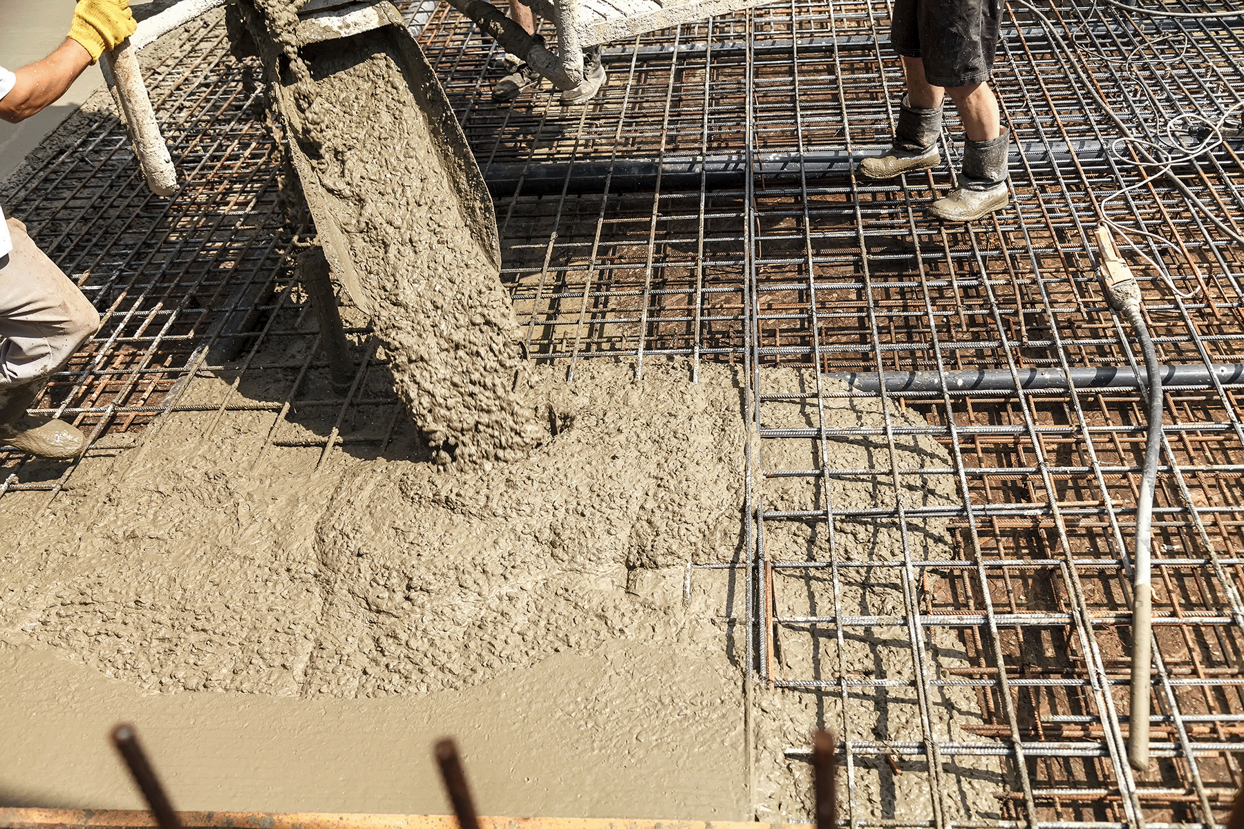 Concrete pour over rebar grid at construction